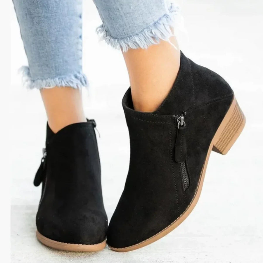 Women's suede side zip ankle boots with decorative stitching