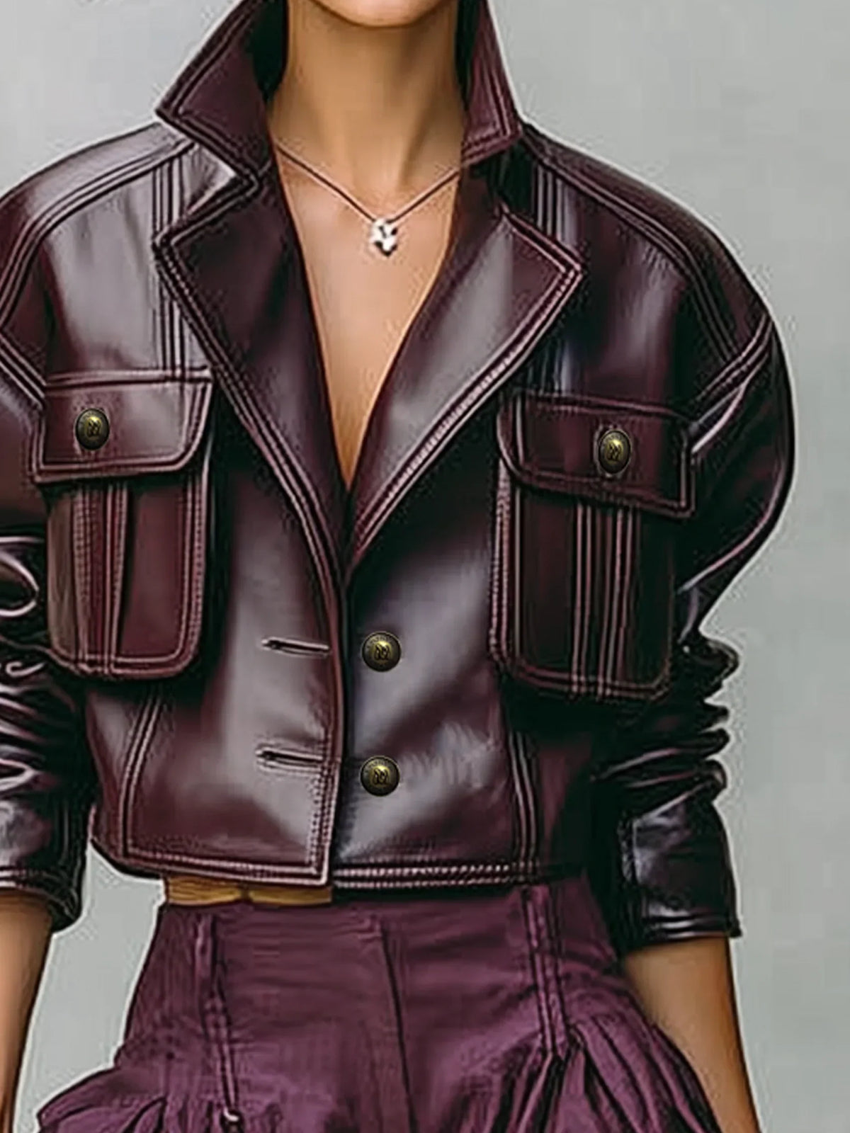 Women's Cropped Leather Jacket with Double Pocket Lapel Collar