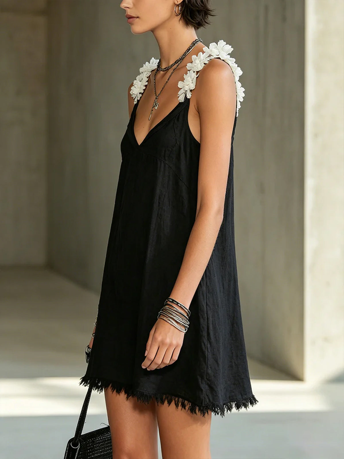 Noémie | Black V-neck mini dress with fringe