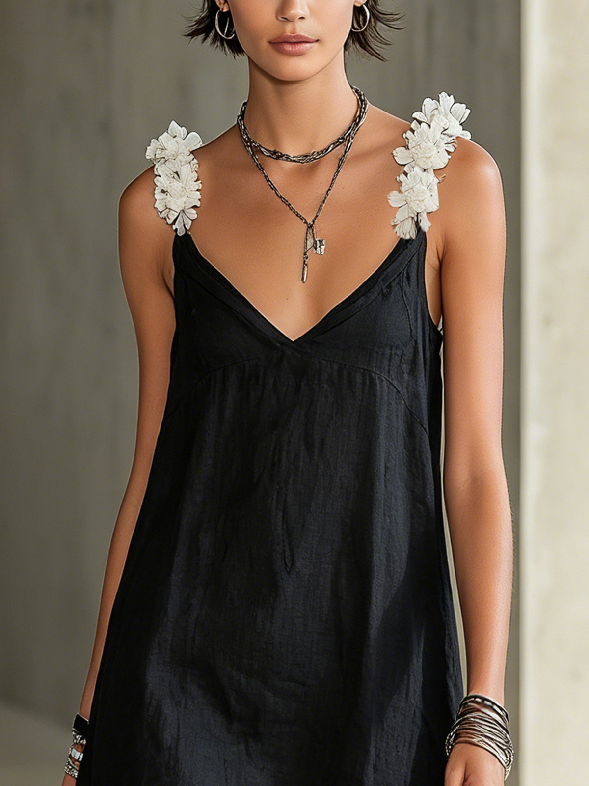 Noémie | Black V-neck mini dress with fringe