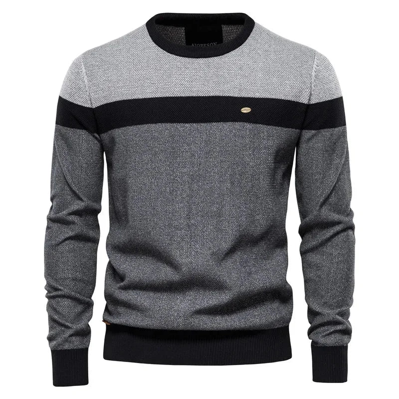 Women's striped knit crew neck sweater with chest emblem