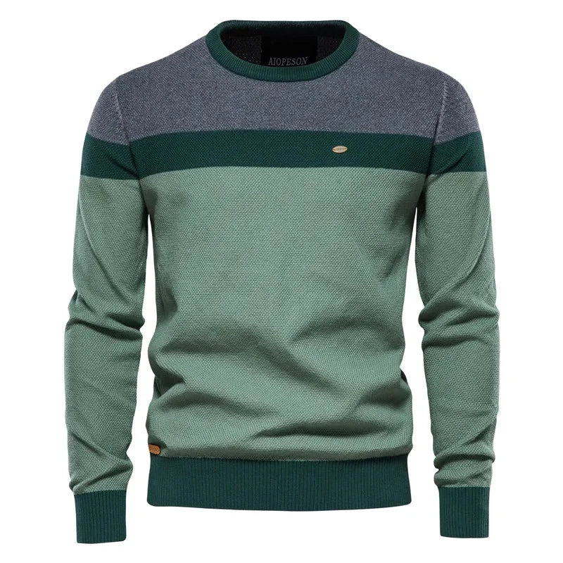 Women's striped knit crew neck sweater with chest emblem