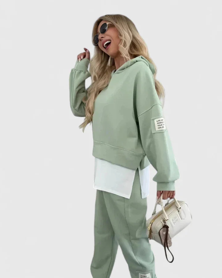 Women's fleece hooded two piece set with layered hem
