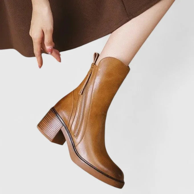 Women's faux leather side zip ankle boots with platform sole