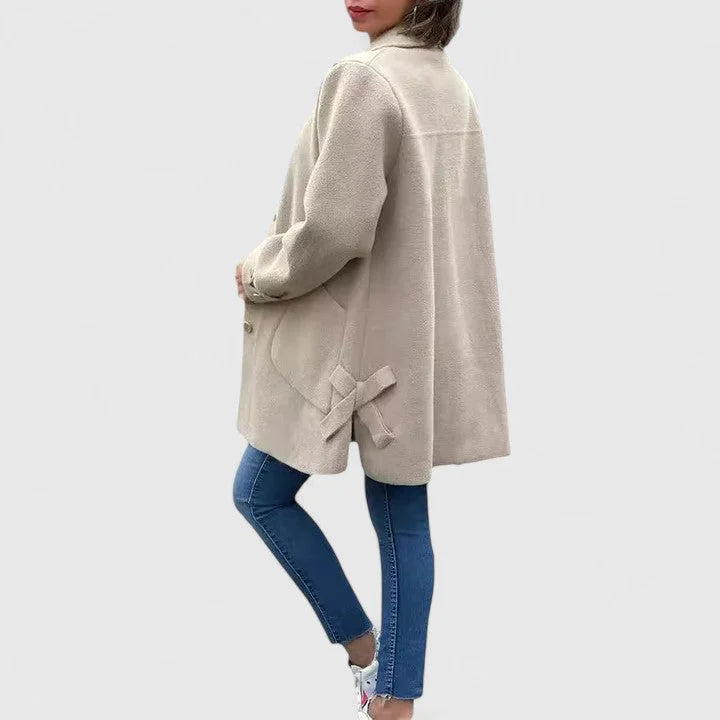 Women's button-front collared wool coat with large patch pockets