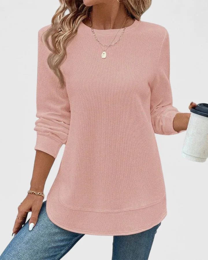 Women's knit crew neck sweater with curved hem