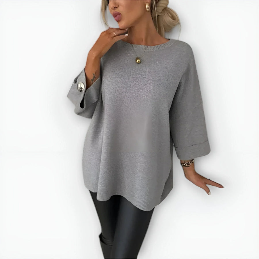 Women's knit crew neck sweater with buttoned cuffs