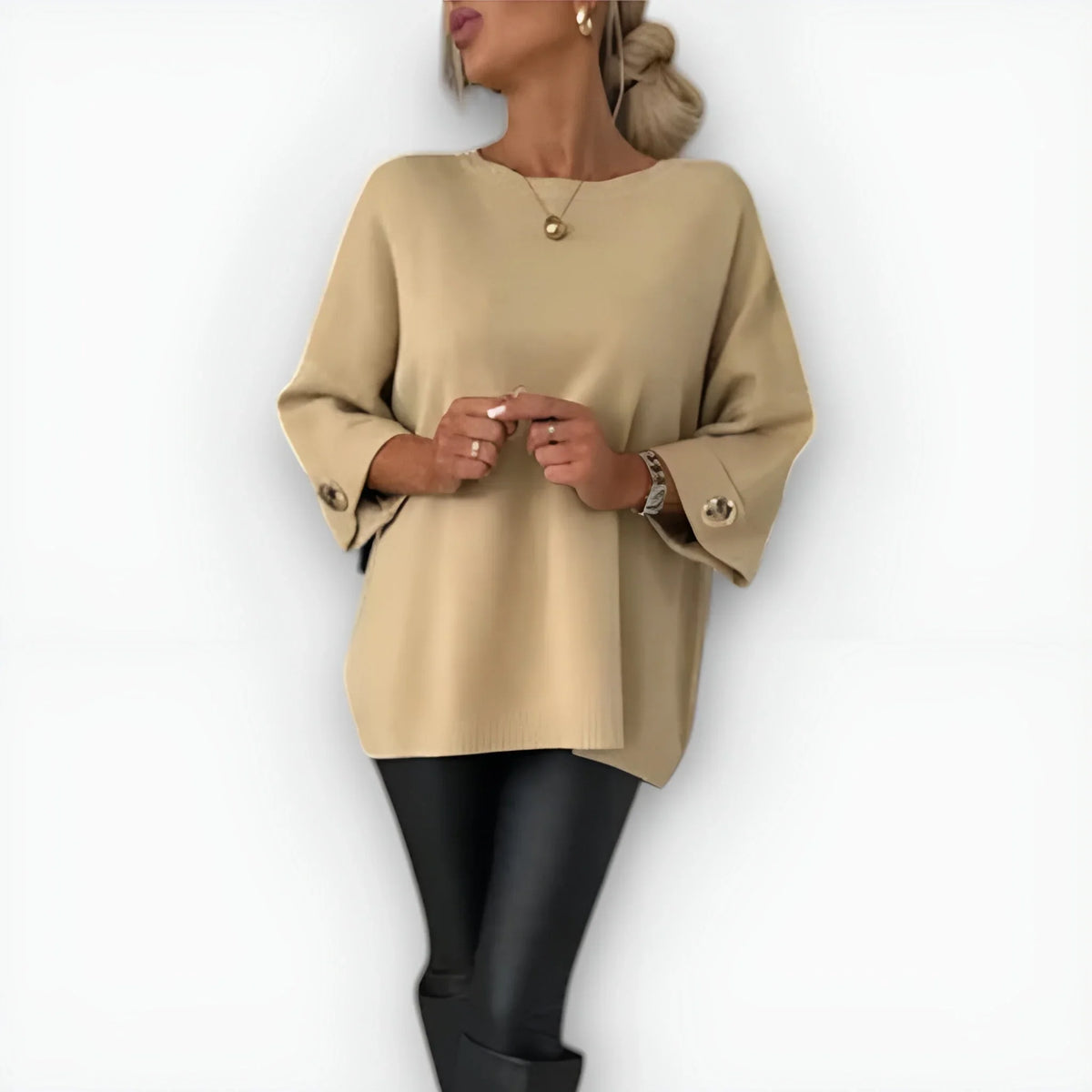 Women's knit crew neck sweater with buttoned cuffs