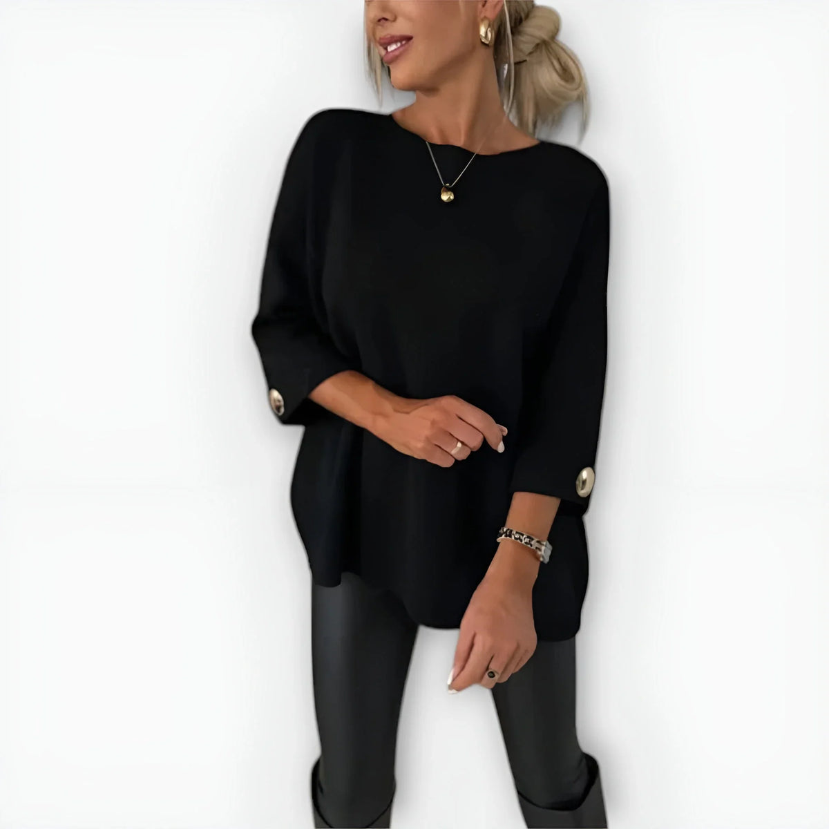 Women's knit crew neck sweater with buttoned cuffs
