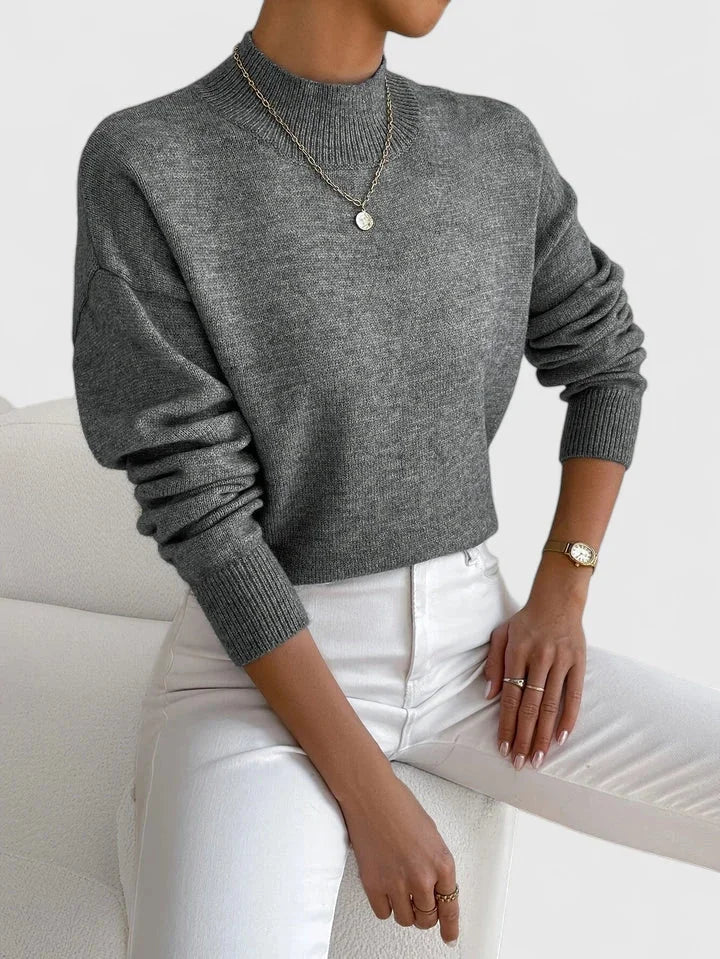 Women's knit stand collar sweater with ribbed cuffs and hem