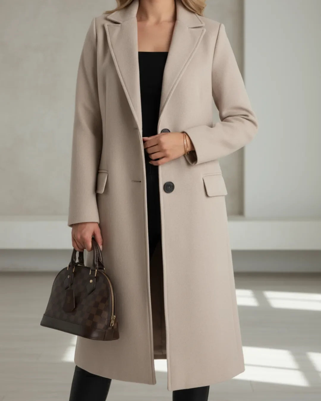 Women's button-front notch lapel wool coat with flap pockets