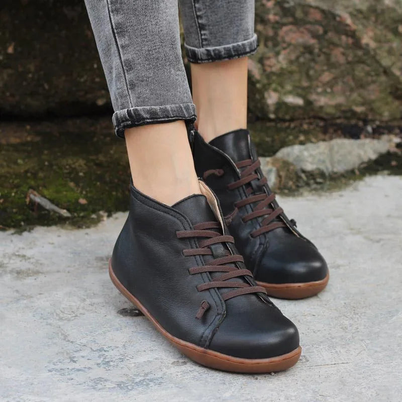 Women's faux leather lace-up ankle boots with side zip and flat sole