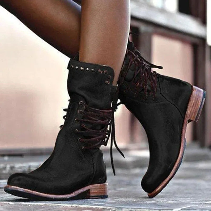 Women's faux leather lace-up ankle combat boots with studded cuff