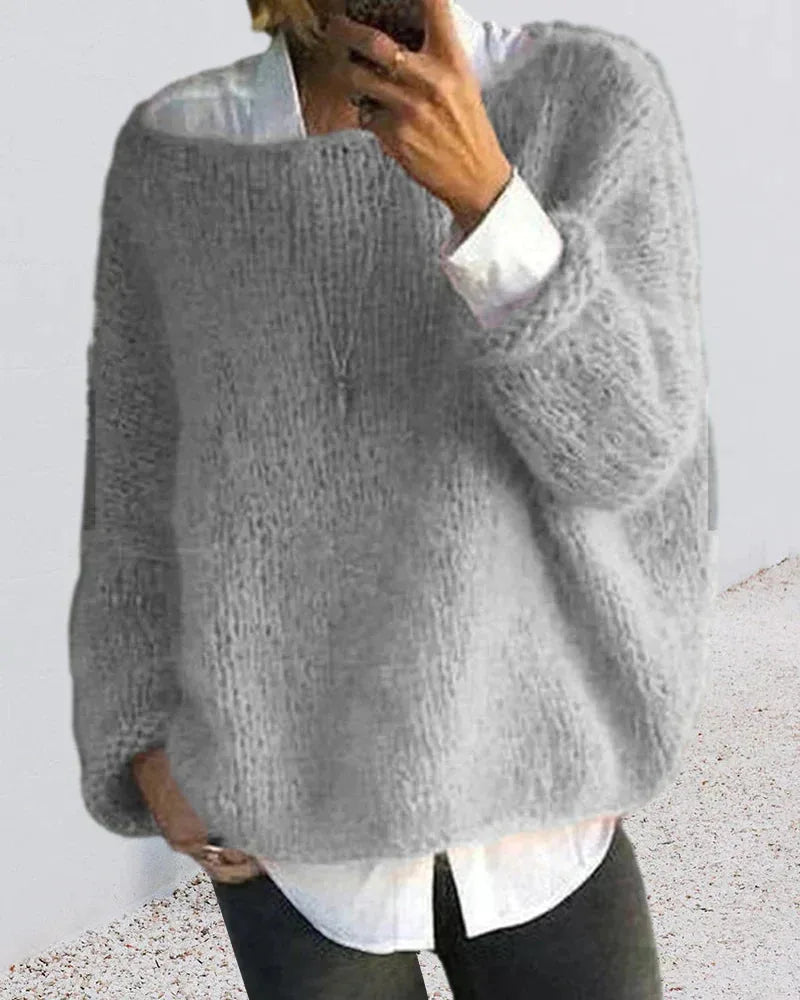 Women's knit crew neck sweater with fuzzy texture