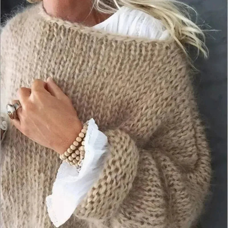 Women's knit crew neck sweater with fuzzy texture