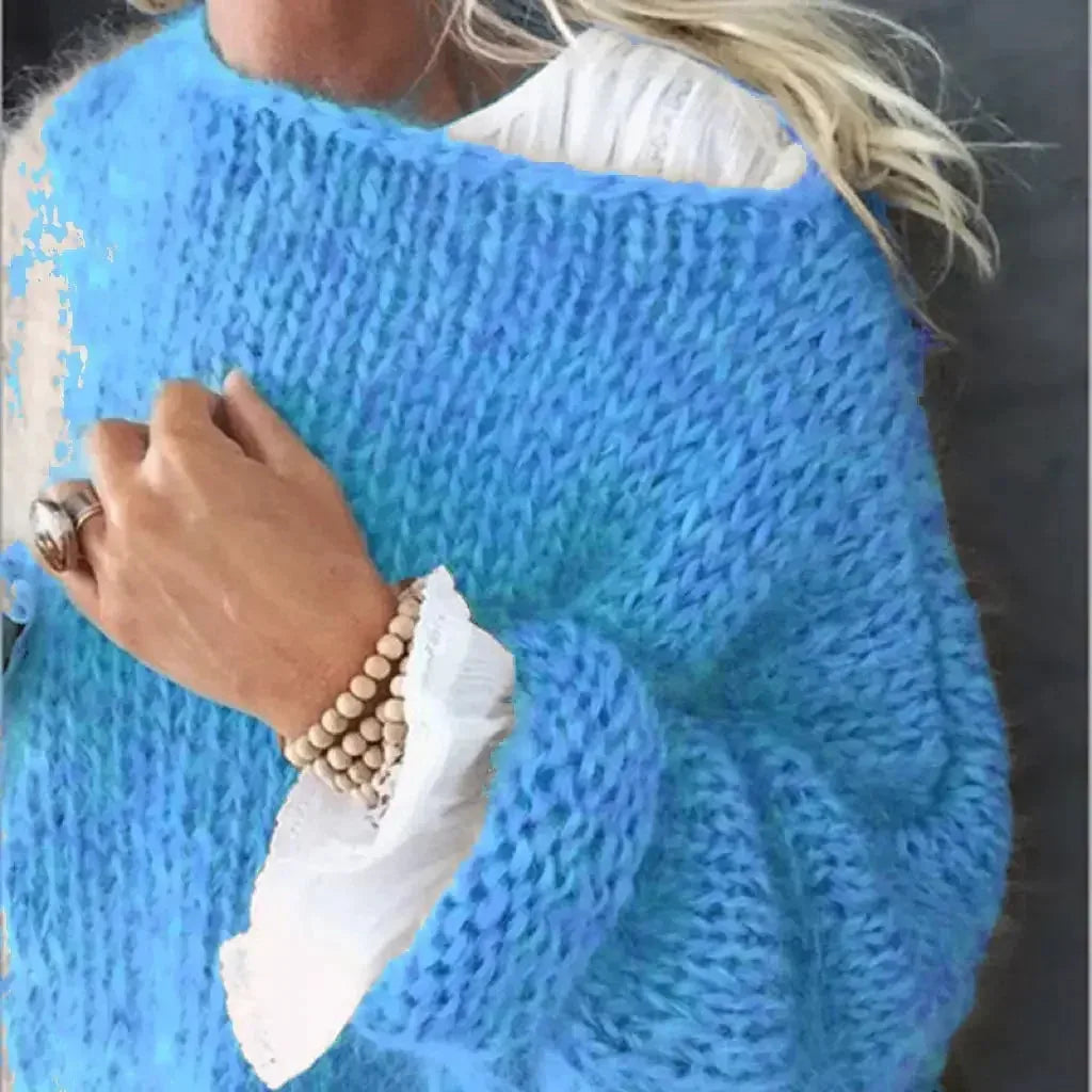 Women's knit crew neck sweater with fuzzy texture