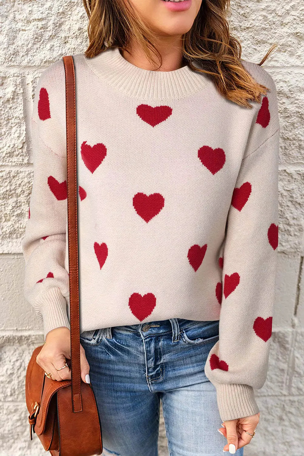 Women's knit crew neck sweater with heart pattern