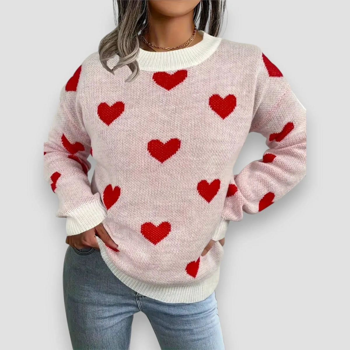 Women's knit crew neck sweater with heart pattern