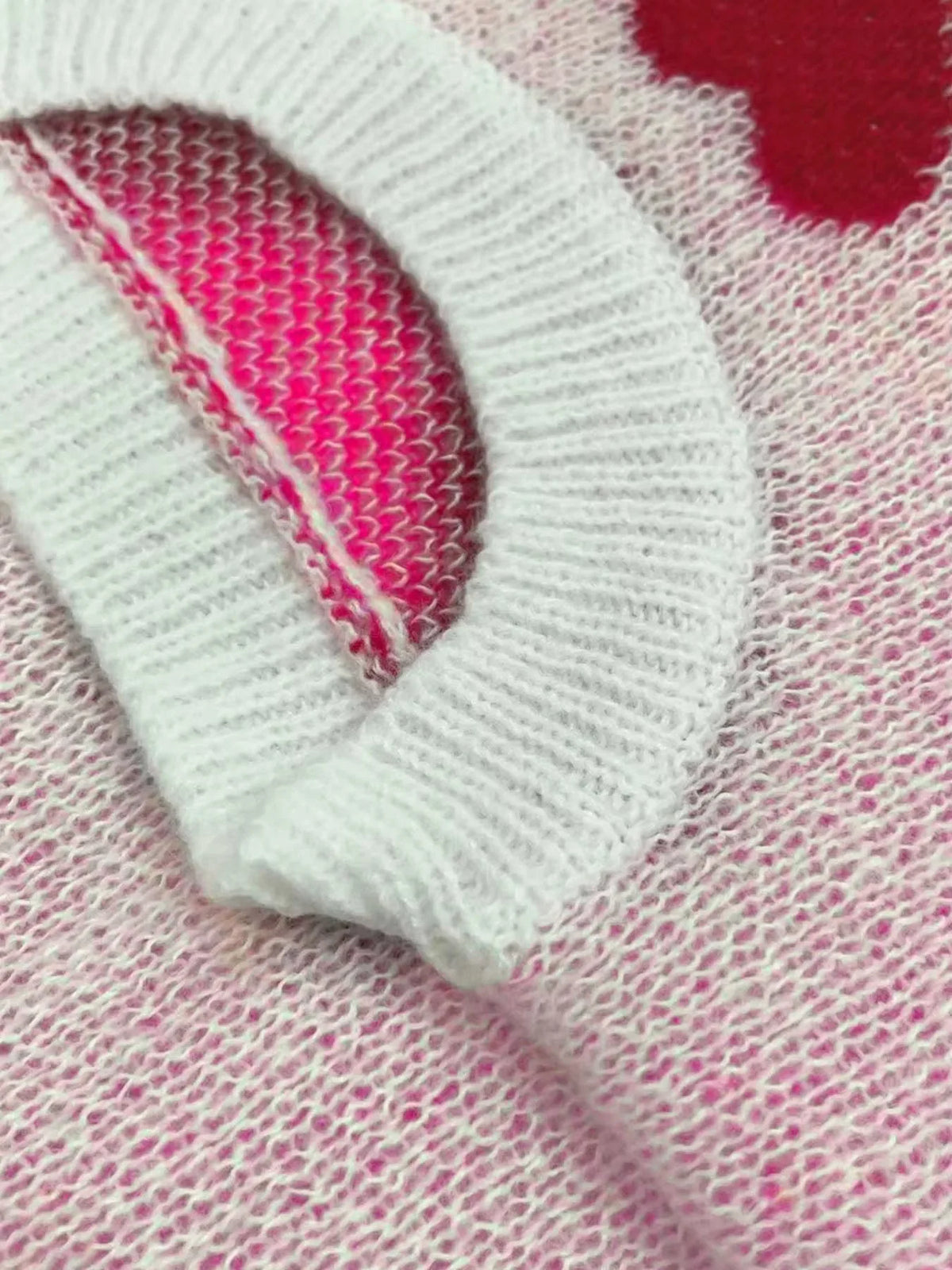 Women's knit crew neck sweater with heart pattern