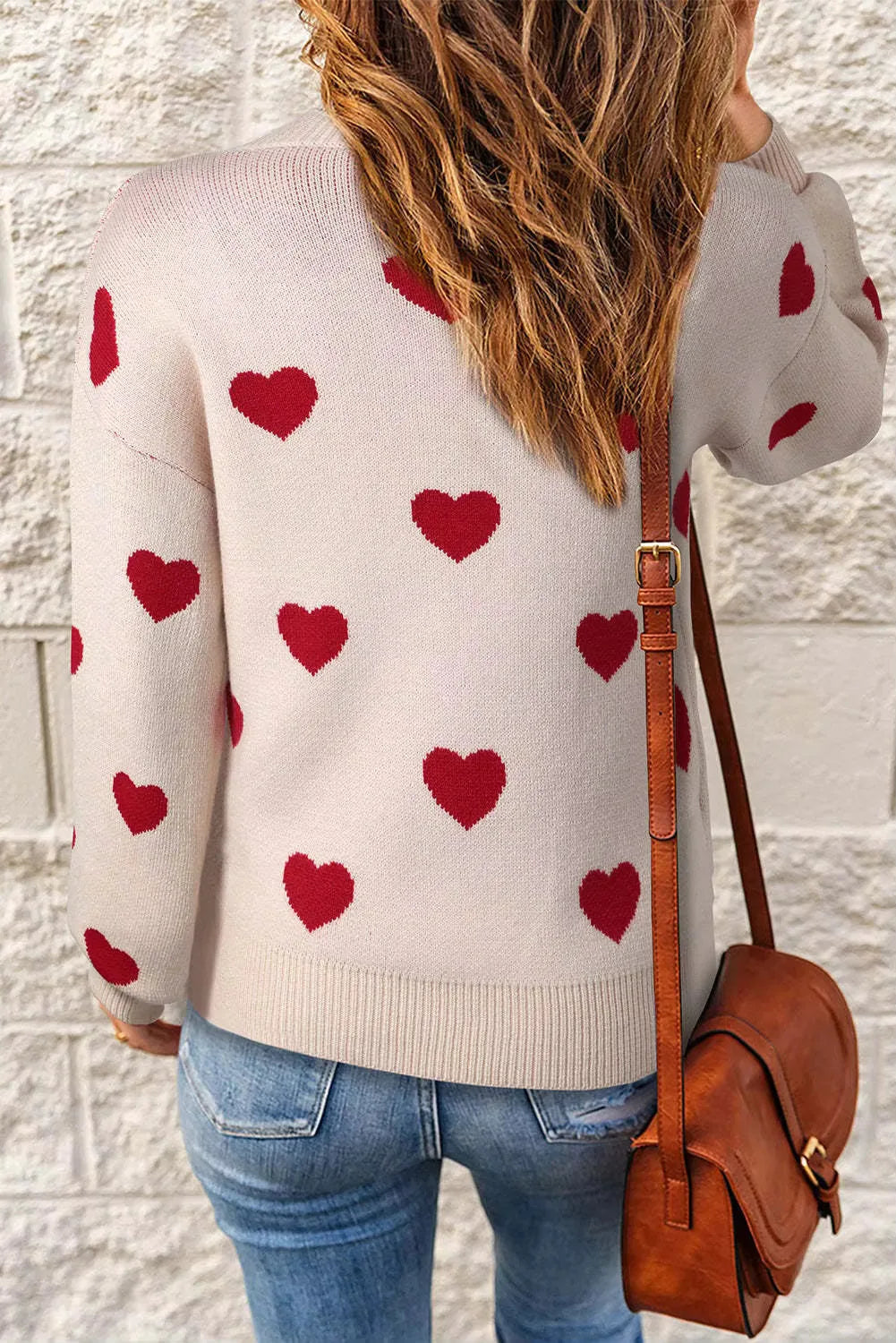 Women's knit crew neck sweater with heart pattern