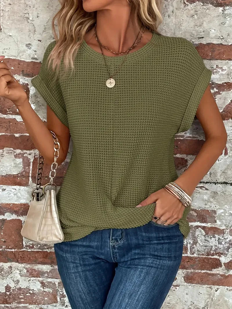 Women's knit crew neck sweater with twisted front hem