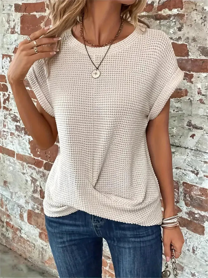 Women's knit crew neck sweater with twisted front hem