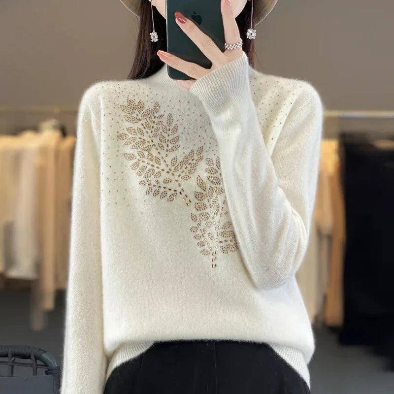Women's knit stand collar sweater with rhinestone leaf embellishment