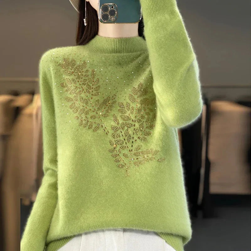 Women's knit stand collar sweater with rhinestone leaf embellishment