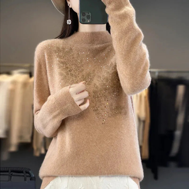 Women's knit stand collar sweater with rhinestone leaf embellishment