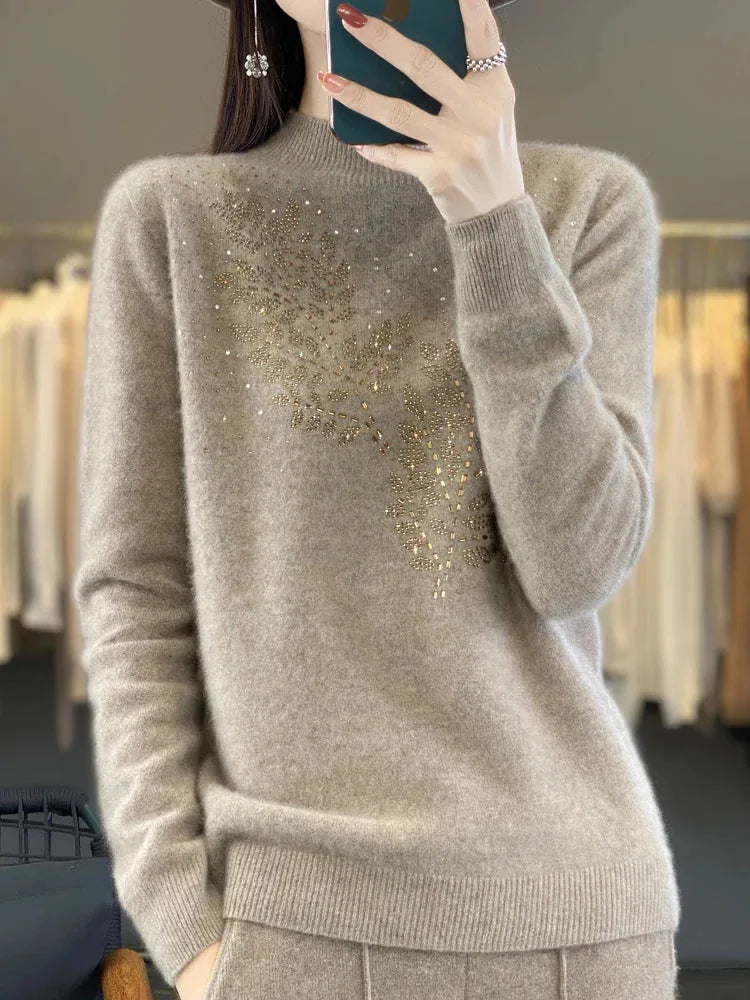 Women's knit stand collar sweater with rhinestone leaf embellishment
