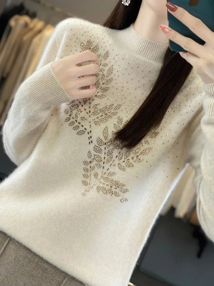 Women's knit stand collar sweater with rhinestone leaf embellishment