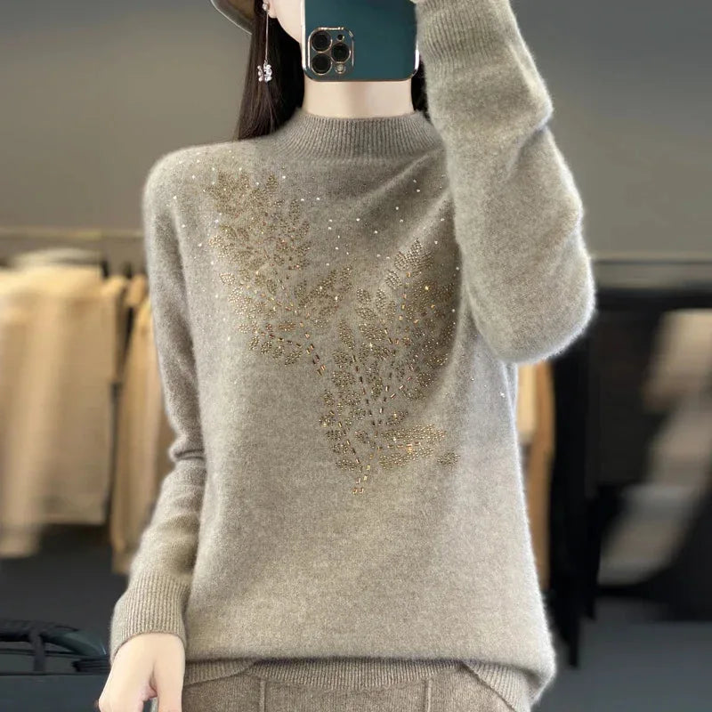 Women's knit stand collar sweater with rhinestone leaf embellishment