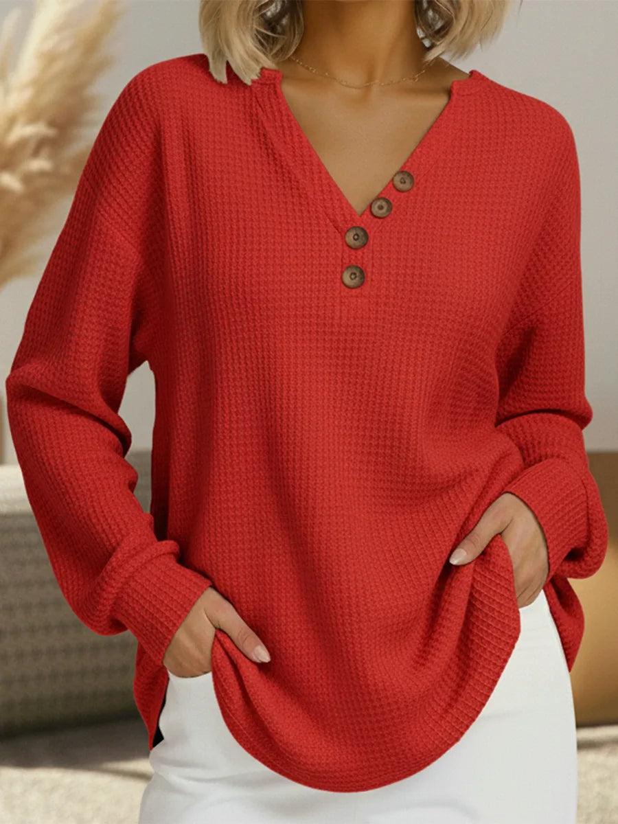 Women's knit v-neck sweater with button placket