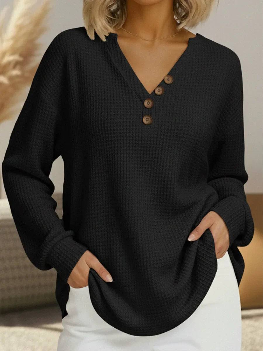 Women's knit v-neck sweater with button placket