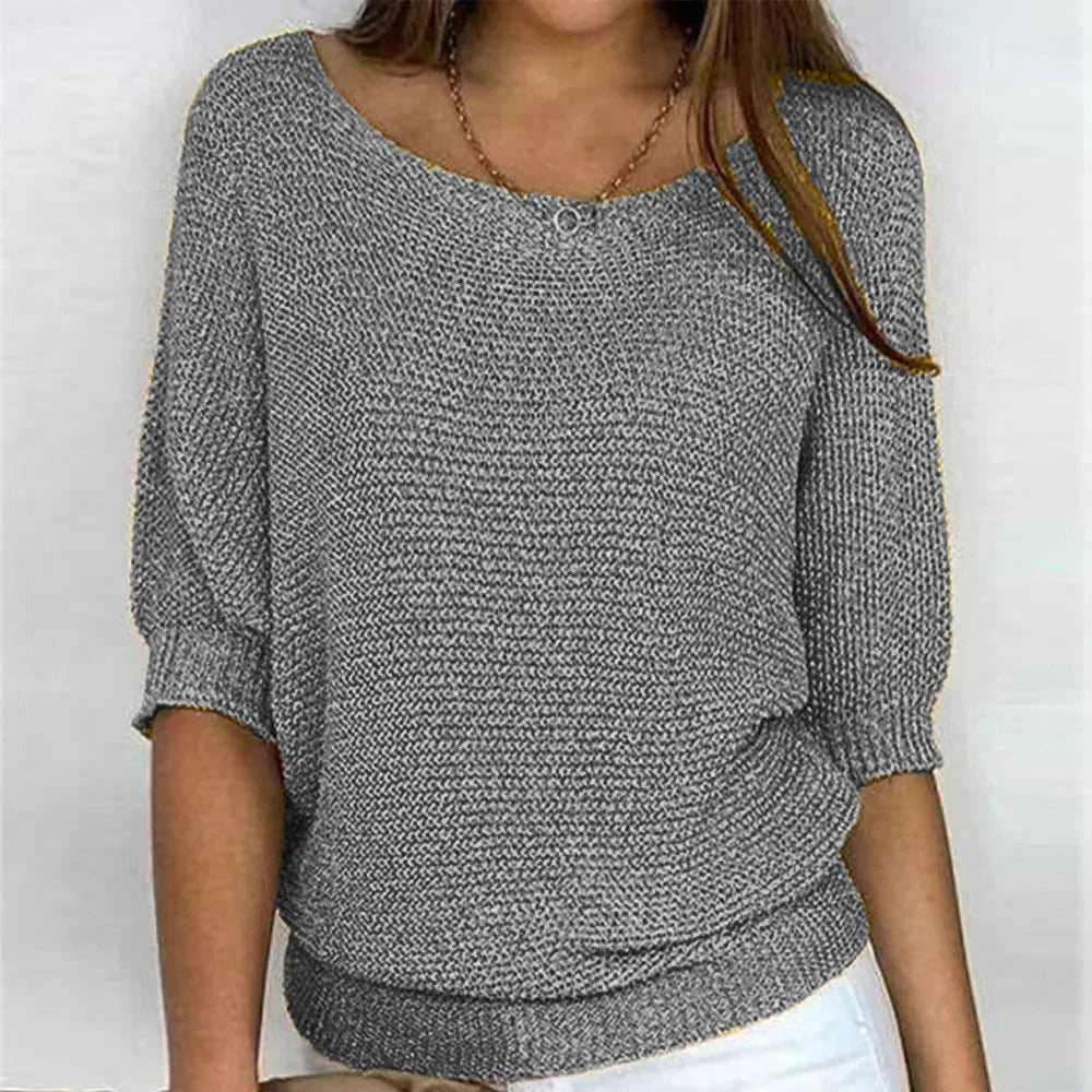 Women's knit v-neck sweater with three-quarter dolman sleeves
