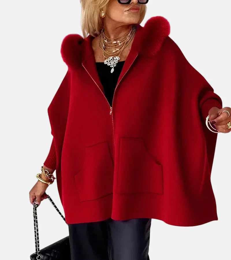 Women's knit zip-up fur cape with front patch pockets
