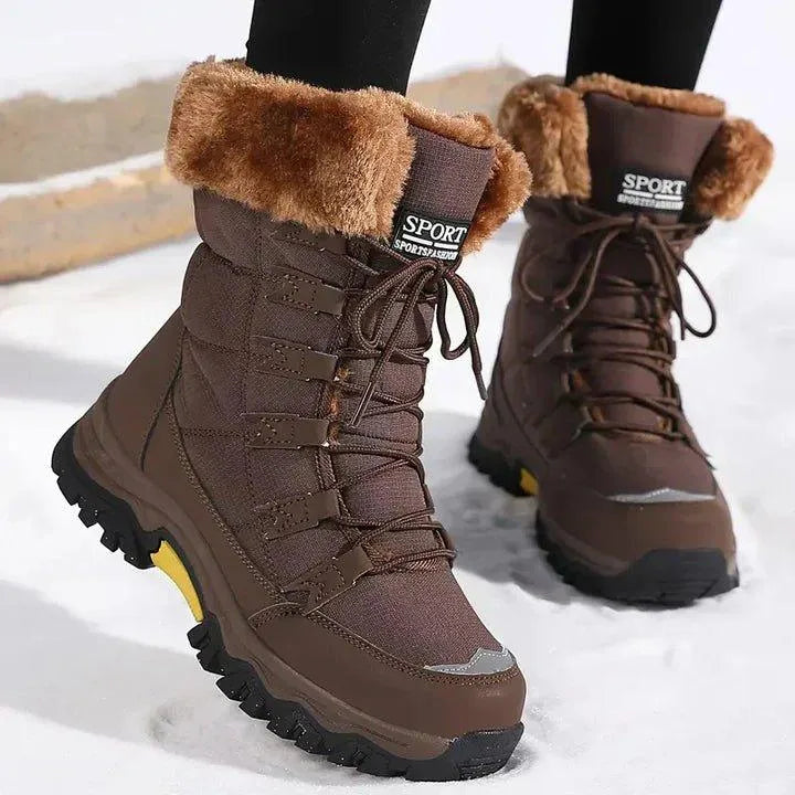 Women's quilted lace-up waterproof combat boots with faux fur trim
