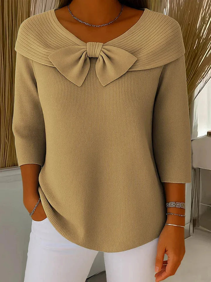 Women's ribbed v-neck sweater with large bow detail