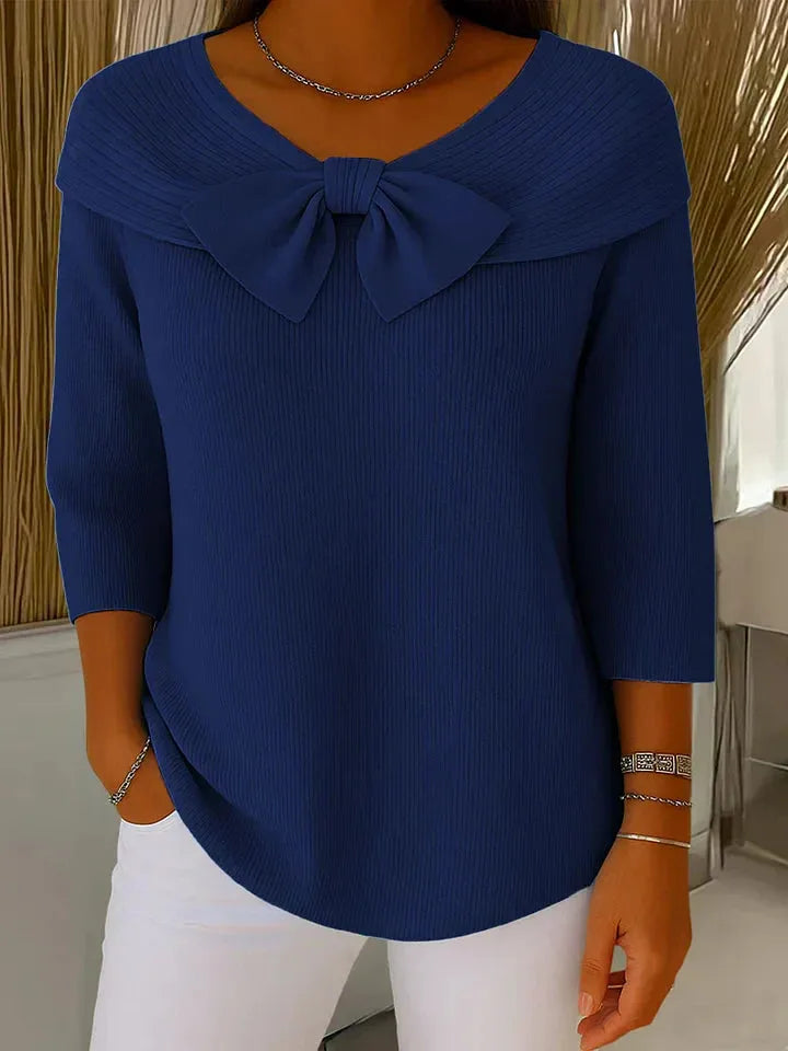 Women's ribbed v-neck sweater with large bow detail