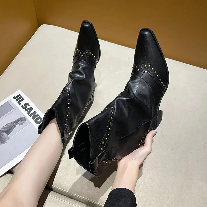 Women's studded faux leather side zip ankle boots