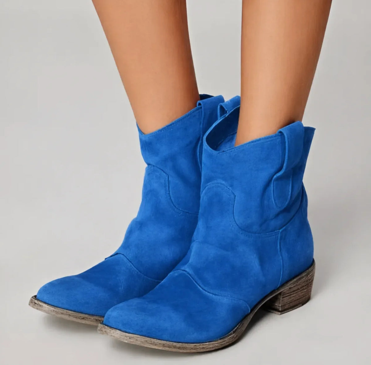 Women's suede side zip ankle boots with v-cut topline and pull tabs