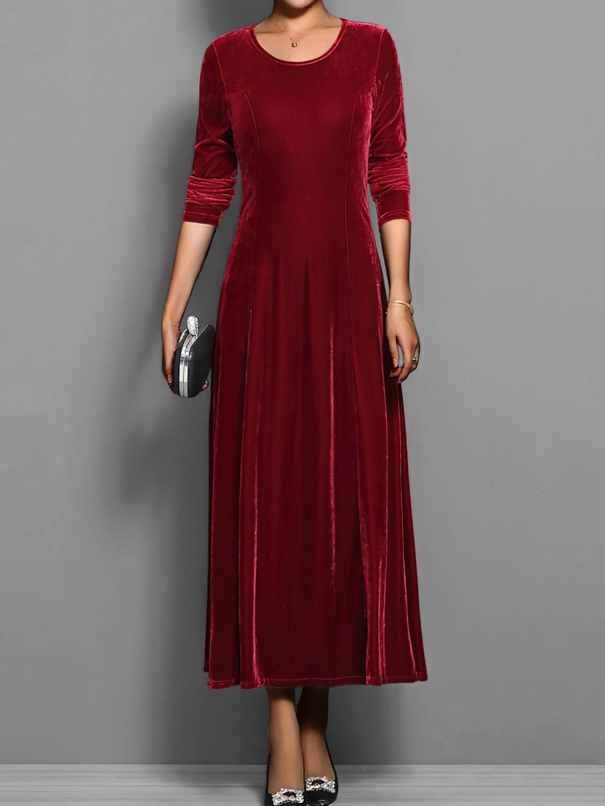 Women's velvet crew neck midi dress with fitted bodice flared skirt