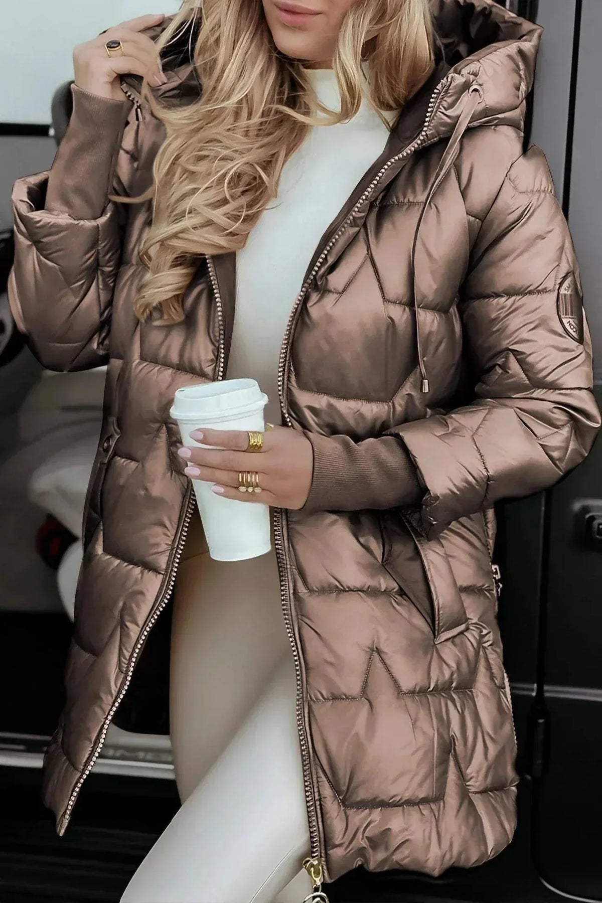 Women's zip-up hooded quilted coat with ribbed cuffs