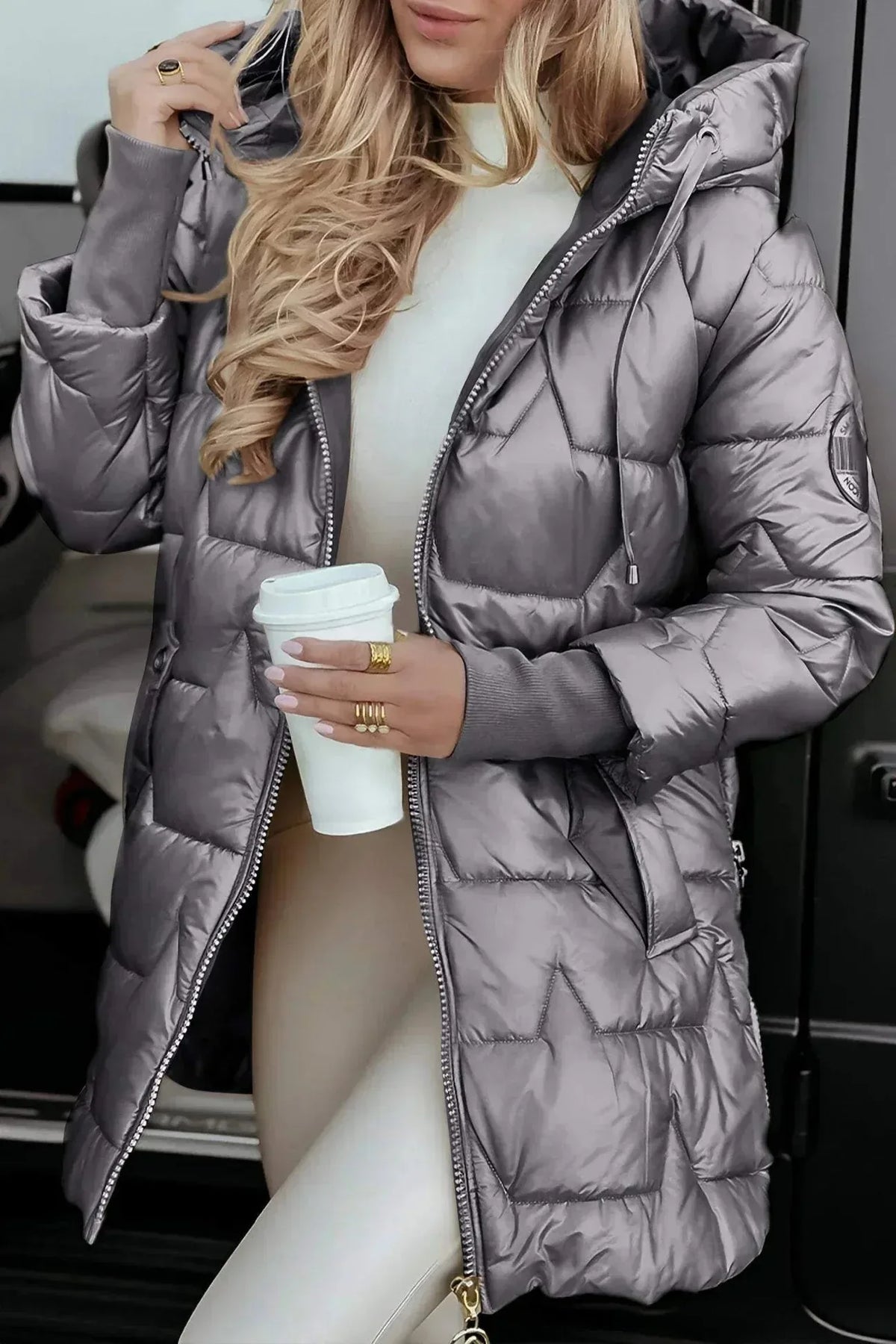 Women's zip-up hooded quilted coat with ribbed cuffs