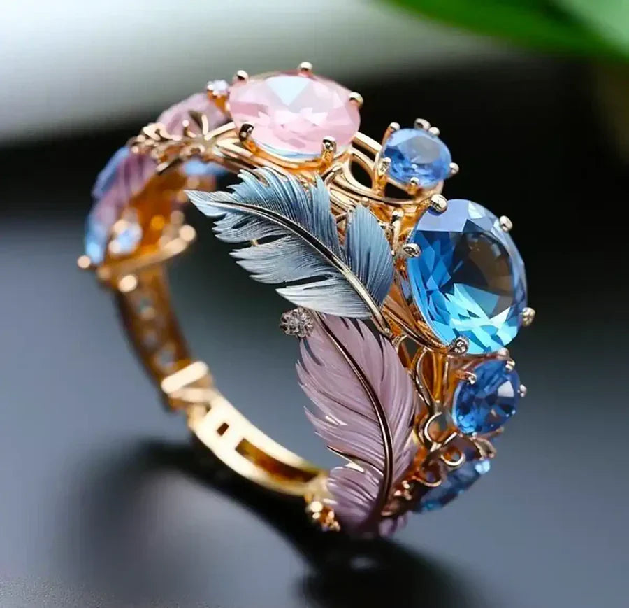 Crystal Statement Ring with Exotic Feather Design in Gold