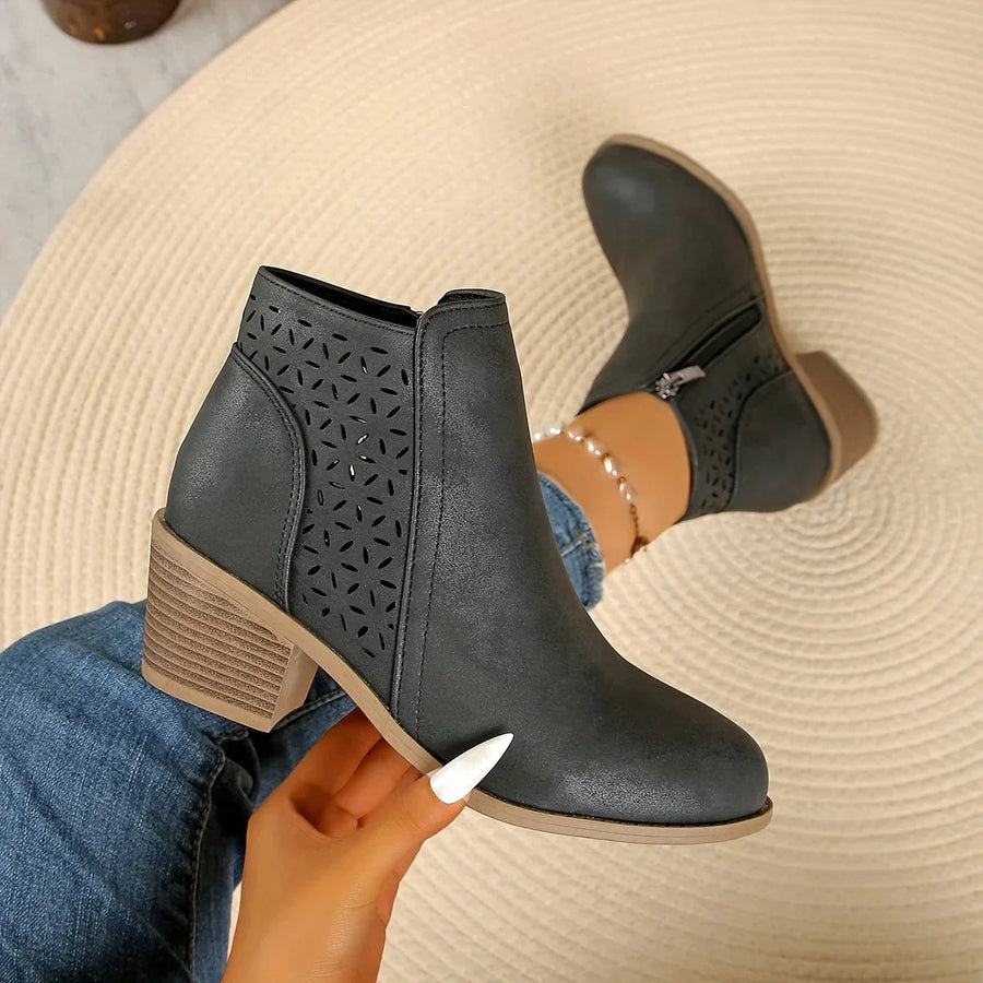 Women's faux leather side zip orthopedic ankle boots with laser-cut perforations