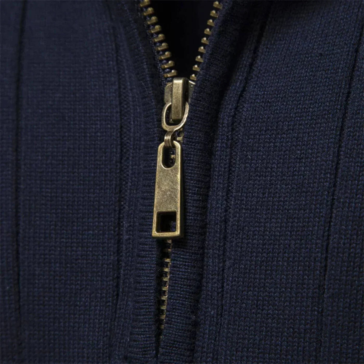Women's ribbed stand collar half zip sweater with small chest emblem