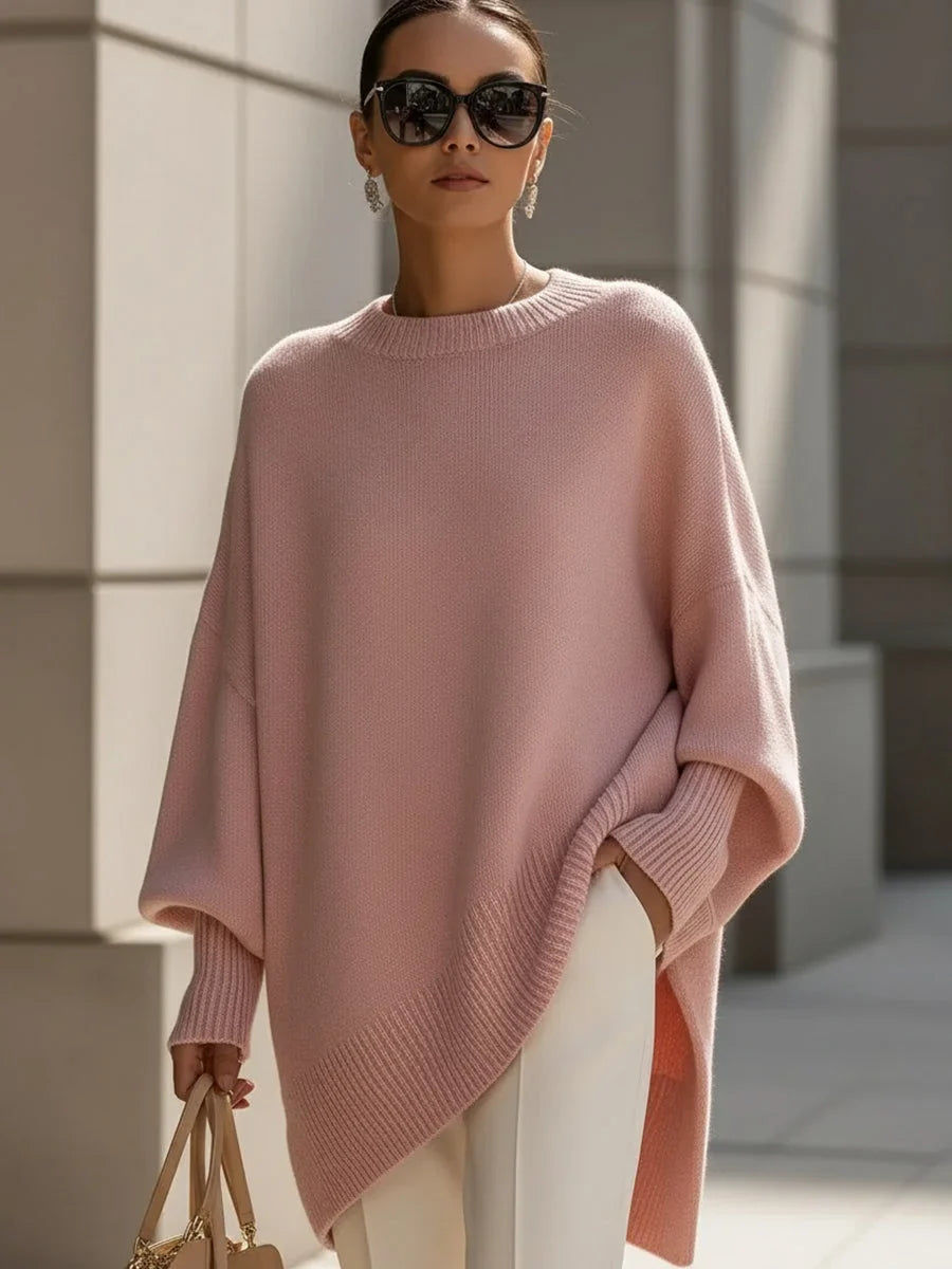 Women's knit crew neck sweater with asymmetrical hem