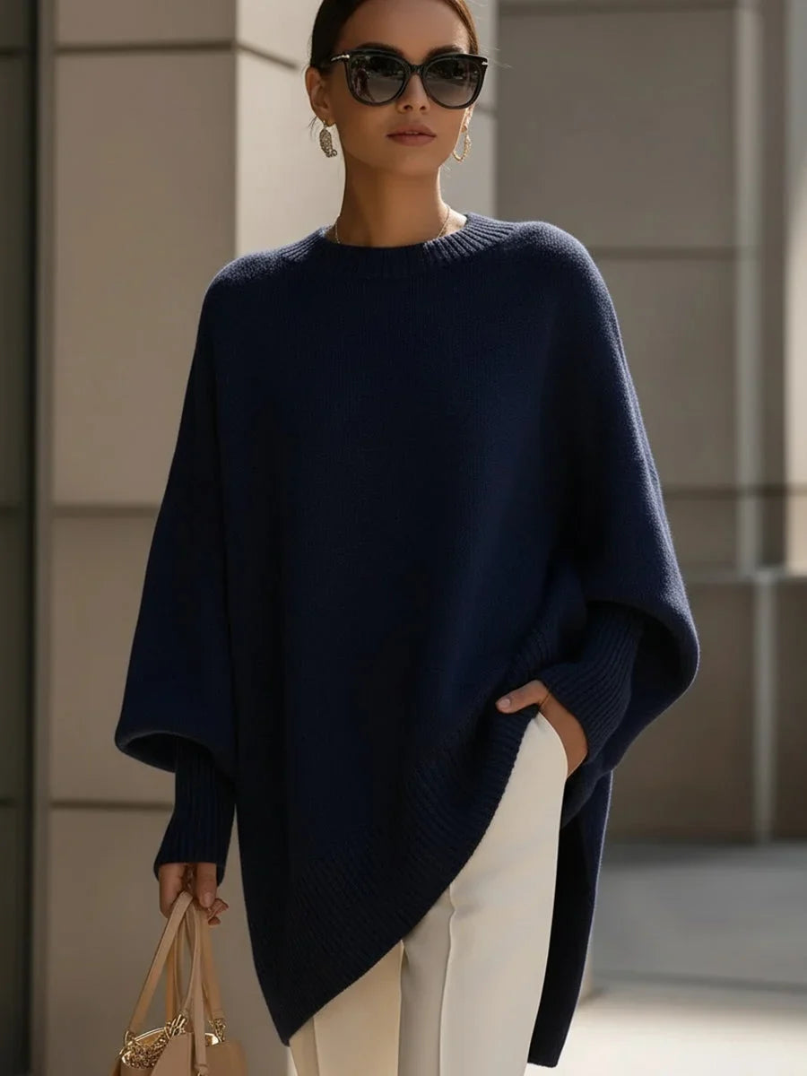 Women's knit crew neck sweater with asymmetrical hem