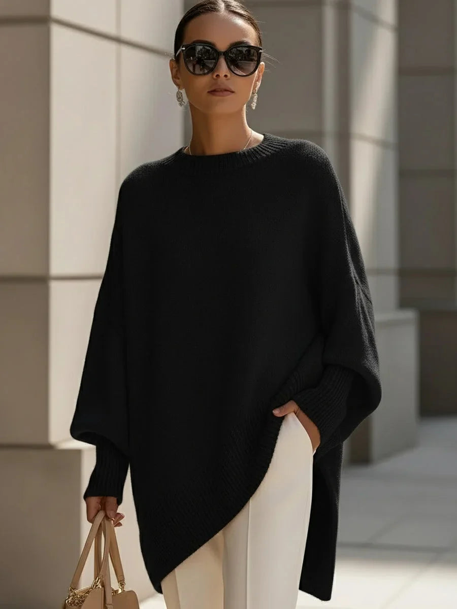 Women's knit crew neck sweater with asymmetrical hem